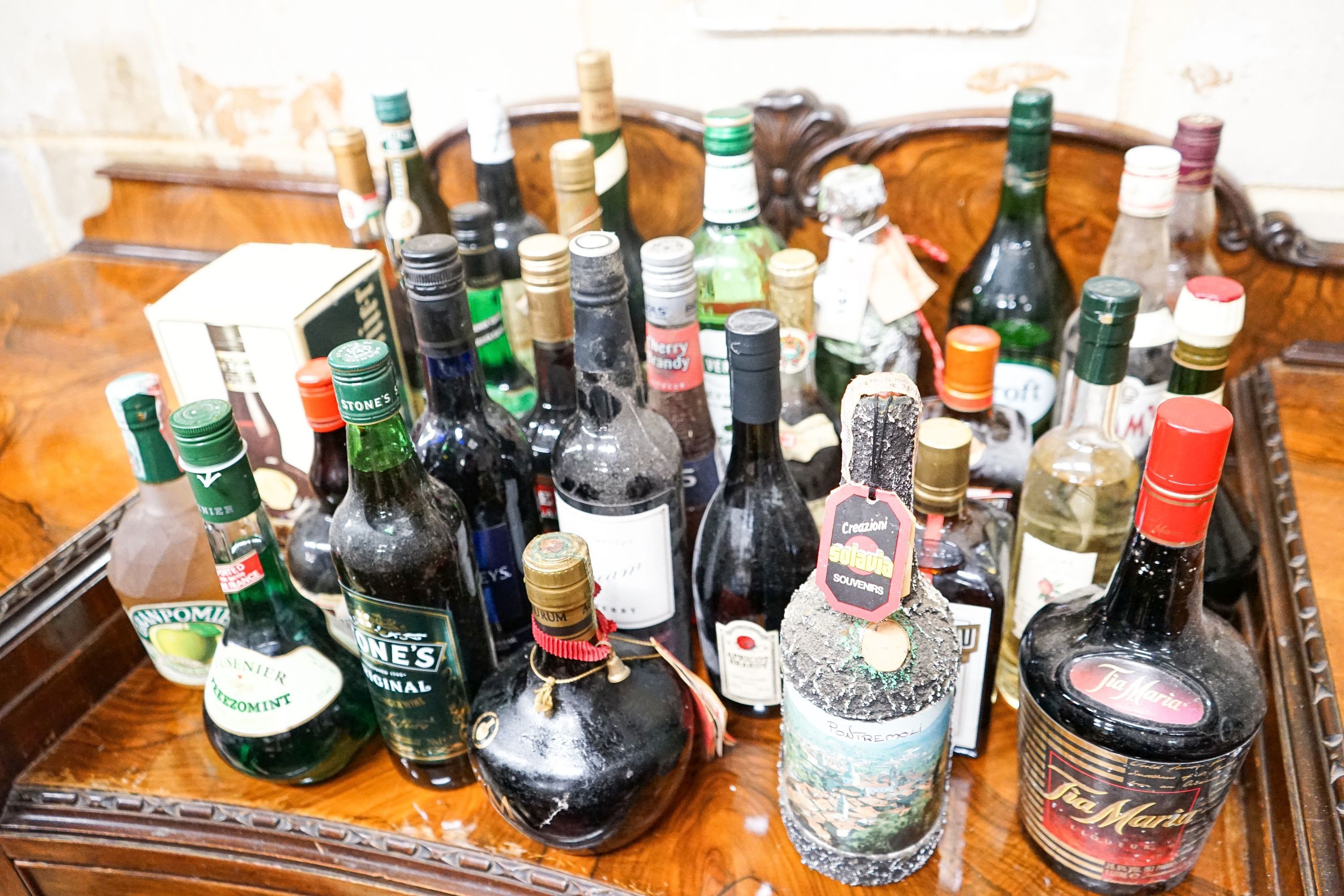 Thirty one bottles of assorted spirits and liqueurs